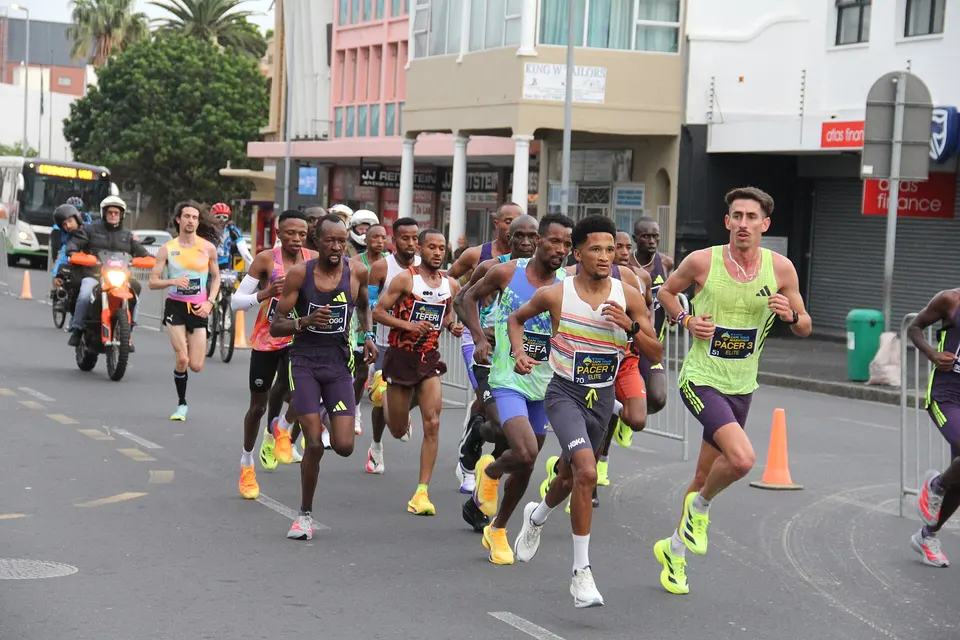 The lead pack on Victoria Road at the 2026 Cape Town Marathon.